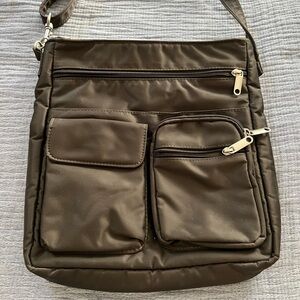 TRAVELSMITH gray travel crossbody purse with lots of pockets